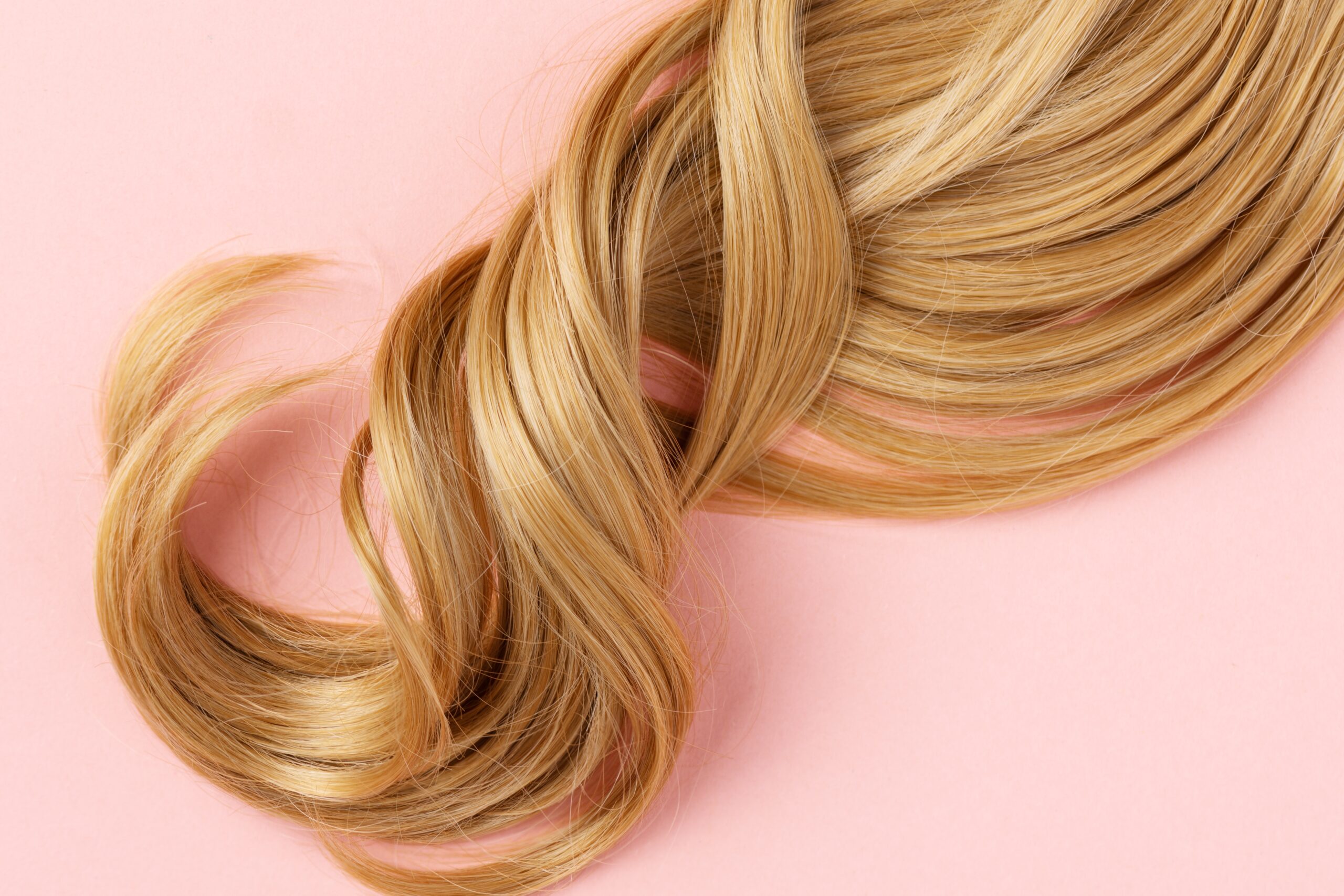 Long,Golden,Blond,Curly,Hair.,A,Part,Of,Blond,Hair